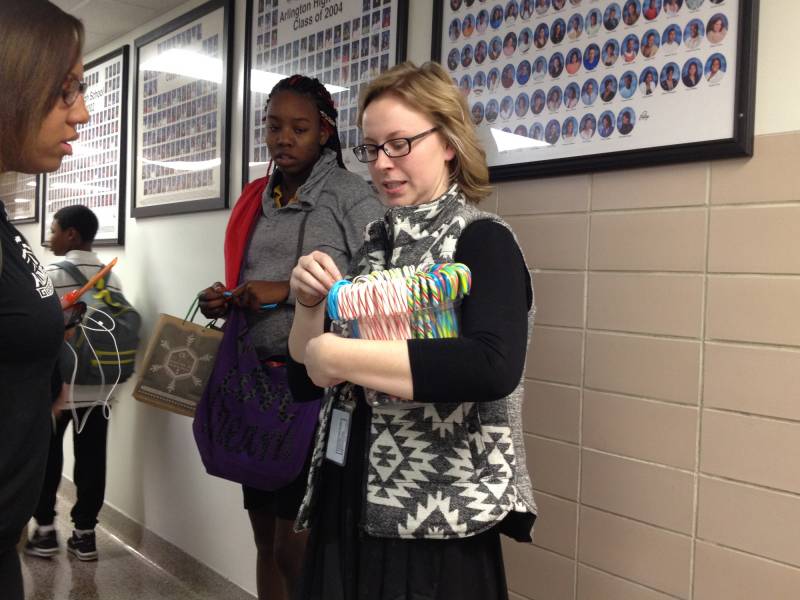 Chemistry teacher Lauren Martin hands out candy canes on the last day of the 2015 school year -- and her last day at Arlington. | By Eric Weddle/WFYI News