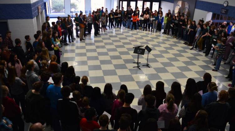 Bethany Christian students gather in the gym lobby for a walkout in remembrance of the Parkland shooting, and to protest for gun law reform and safer schools.  - Jennifer Weingart/WVPE