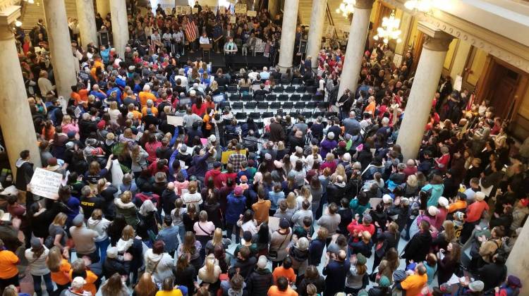 Protesters filled the main floor of the Indiana Statehouse Saturday after snow drove them indoors. -  Jeanie Lindsay/IPB News