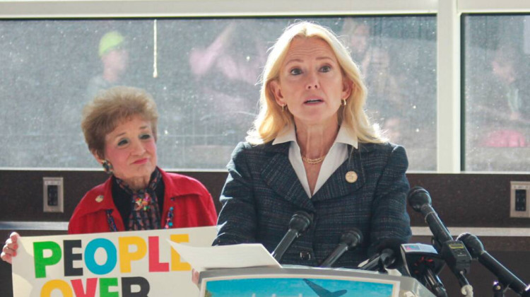 Sen. Shelli Yoder (D-Bloomington) spoke to reporters at the Indianapolis Airport on Aug. 26, 2025 as Republican state lawmakers headed to the White House amid a push from the Trump administration for Indiana to redraw its congressional districts. Behind Yoder is Rep. Sheila Klinker (D-Lafayette). - Brandon Smith / IPB News