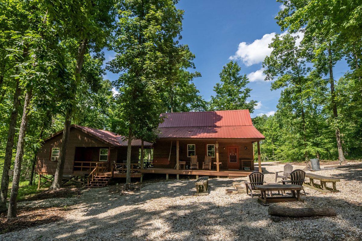 The 220 mostly-wooded acres also contain a 1,176 sq ft cabin.