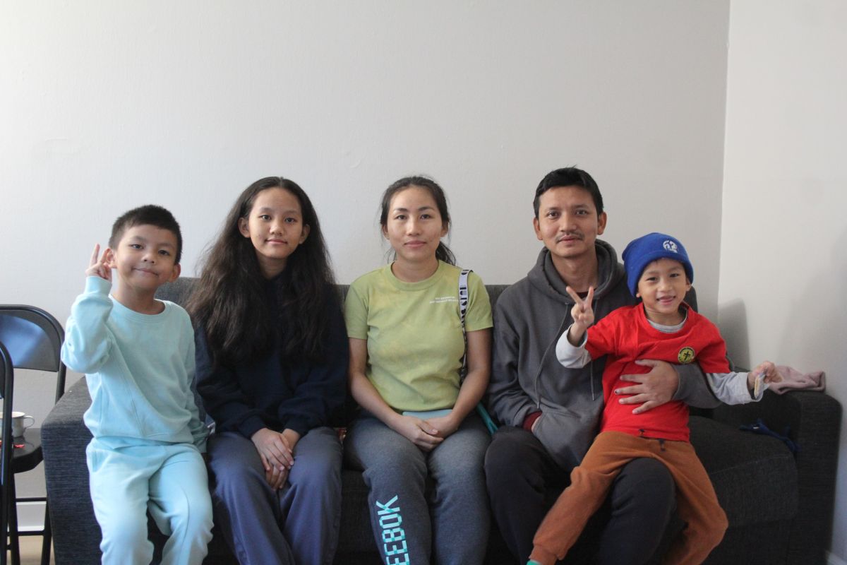 Burmese refugees Esther Hlawn Mual, John Lal Ruat and their children arrived in Indiana at the end of December 2024.