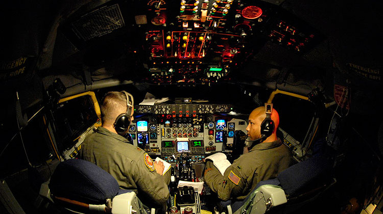 KC-135 Stratotanker pilots from the 74th Air Refueling Squadron based at Grissom Air Force Reserve Base go over their checklist before coming in on approach to Hickam Air Force Base, Hawaii. - U.S. Air Force photo/Tech. Sgt. Shane A. Cuomo