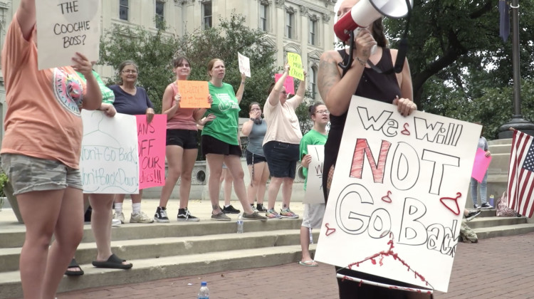 Protesters gather outside the Indiana Statehouse in 2022, demonstrating against the special legislative session to ban nearly all access to abortion care. - Alan Mbathi / IPB News