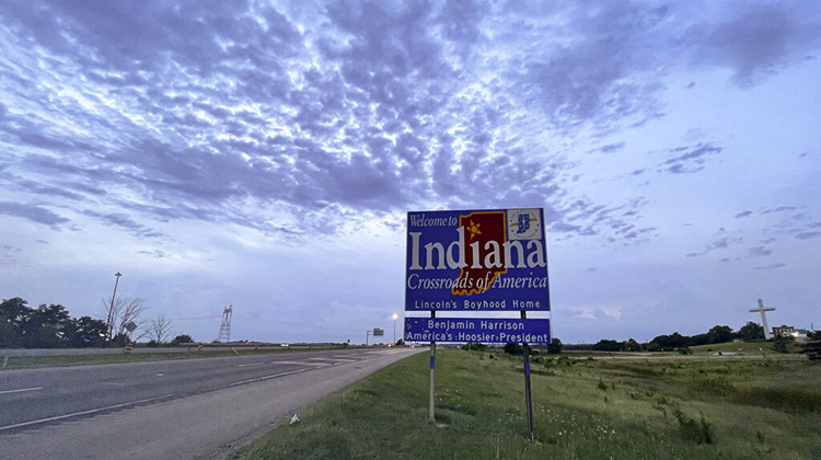 This photo from, August 3, 2022, shows a sign on Interstate 70 West in Richmond, Indiana, welcoming travelers to Indiana. Monica Eberhart traveled this route from Dayton, Ohio to Indianapolis to receive abortion care. - AP Photo/Patrick Orsagos, File