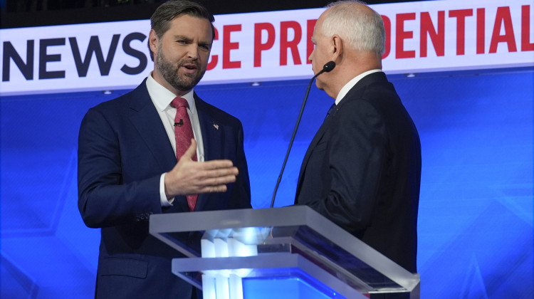 Republican vice presidential nominee Sen. JD Vance, R-Ohio, talks with Democratic vice presidential candidate Minnesota Gov. Tim Walz after the vice presidential debate hosted by CBS News Tuesday, Oct. 1, 2024, in New York. - Matt Rourke / AP Photo