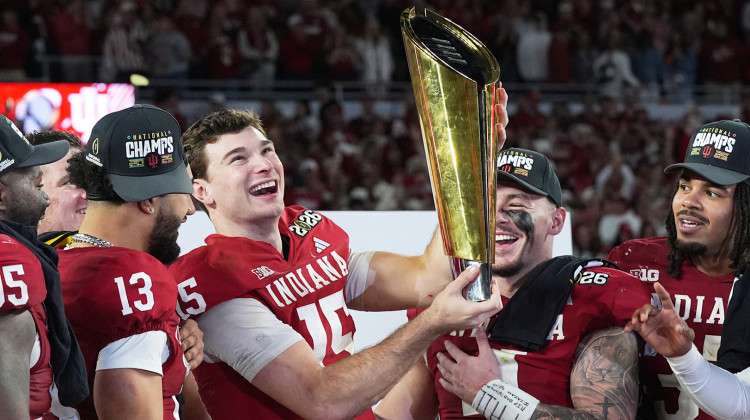 Indiana completes undefeated season and wins 1st national title, beating Miami 27-21 in College Football Playoff final