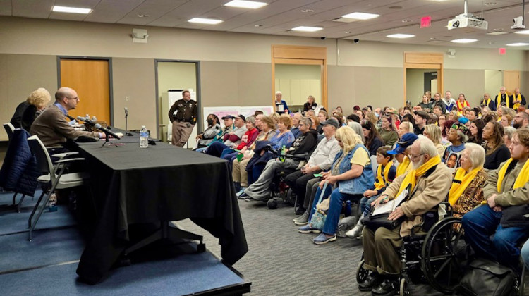 Sen. Vaneta Becker (R-Evansville) and Sen. Jim Tomes (R-Wadesville) talk with constituents during a third house forum at the Evansville Vanderburgh Public Library.  - League of Women Voters of Southwestern Indiana / Facebook