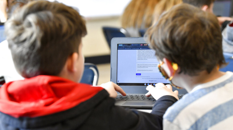 Students at Stonewall Elementary in Lexington, Ky. each summarized a text about boxing champion and Kentucky icon Muhammad Ali then tried to figure out which summaries were penned by classmates and which was written by the chatbot in February  2023.  - Timothy D. Easley / AP Photo