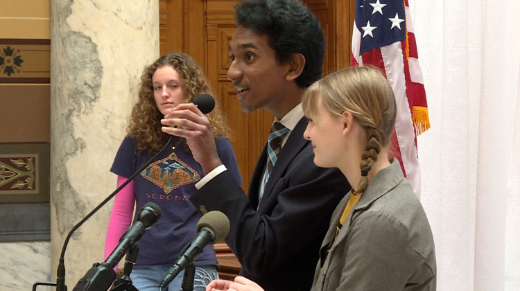 Co-leaders of the youth activist group Confront the Climate Crisis Rahul Durai (left) and Ashlyn Walker (right) at an event last year urging lawmakers to create a climate task force. - Rebecca Thiele / IPB News