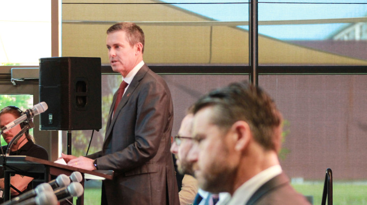 Eli Lilly CEO Dave Ricks announced the company's additional $4.5 billion investment in the central Indiana LEAP District at a press conference on Oct. 2, 2024. In the foreground are a panel of company and government officials, including U.S. Sen. Todd Young (R-Ind.). - Brandon Smith / IPB News