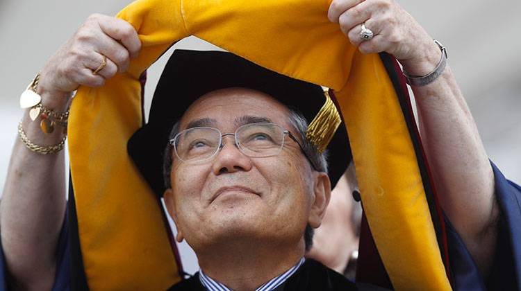 FILE - In this May 16, 2011 file photo, Nobel Prize winning chemistry professor Ei-ichi Negishi, of Japan, receives an honorary degree at the University of Pennsylvania's 255th Commencement, in Philadelphia. Authorities in northern Illinois are investigating the death of Negishi's wife, whose body was found at a landfill hours after the couple were reported missing in Indiana. - AP Photo/Matt Rourke, File