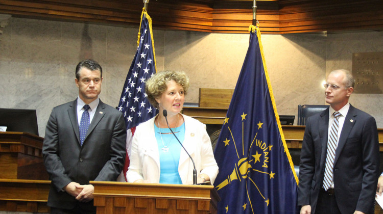 U.S. Rep. Susan Brooks (R-Carmel) speaks to media. U.S. Sen. Todd Young (R-Ind.), left, and FCC Commissioner Brendan Carr, right, applaud Indiana's leadership on 5G technology. - Samantha Horton/IPB News