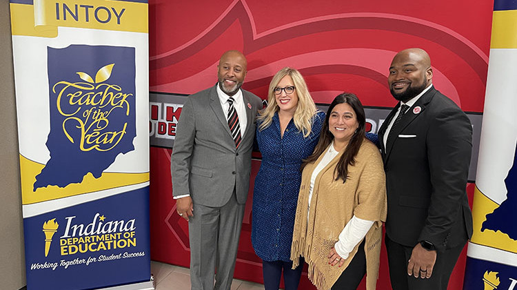 Indiana Teacher of the Year Graciela Miranda stands with MSD of Pike Township Superintendent Larry Young, Indiana Secretary of Education Katie Jenner and Pike High School principal Jeremy Wolley on Friday, Sept. 27, 2024 at the school. - Sydney Dauphinais/WFYI