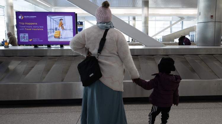 A family of refugees arrives at the Indianapolis International Airport earlier this year.  - Jeremy Rueben / WFYI