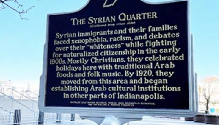 One side of the historical marker in downtown Indianapolis. - Courtesy of the Indiana Historical Bureau