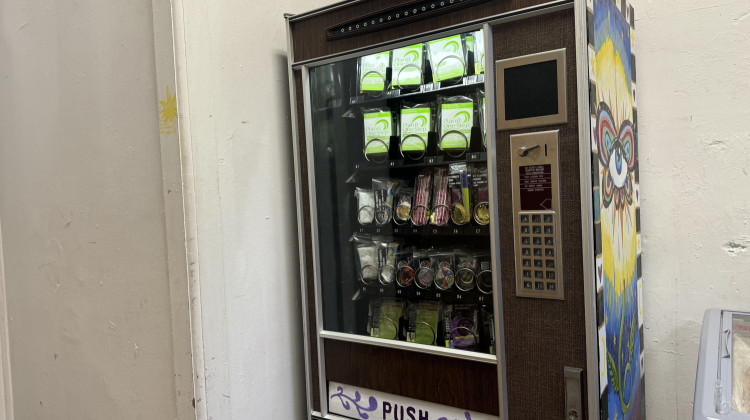 The new vending machine in Eleventh House coffee shop in Lafayette offers free contraception, condoms and period products.  - Sam Horton / WFYI