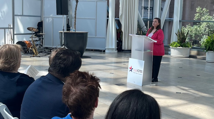 Marion County Clerk Kate Sweeney Bell speaks the voting event at the Indianapolis Artsgarden. - Jill Sheridan / WFYI