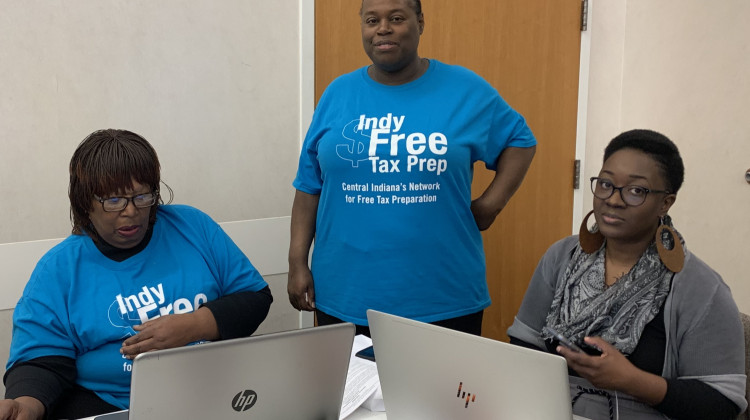 Workers get ready to help people get signed up for Indy Free Tax Prep.