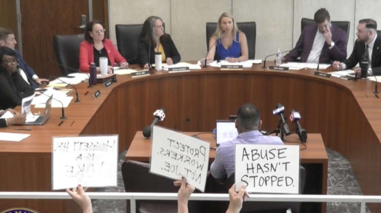 The investigative committee discussing the final report that details sexual harassment response. - Screenshot from Channel 16