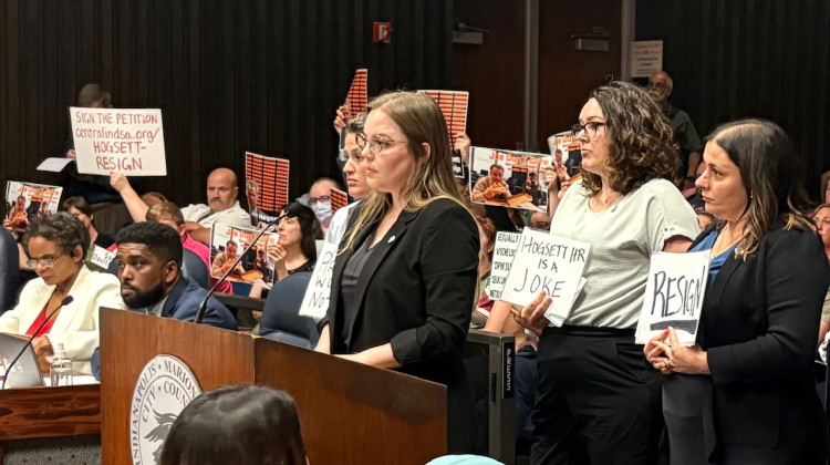Lauren Roberts testified at the City-County Council meeting Monday night, surrounded by supporters. - Jill Sheridan / WFYI