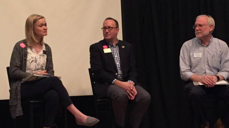 Tim Brimmer (right) takes part in a panel about dementia and music therapy.  - Jill Sheridan/IPB News