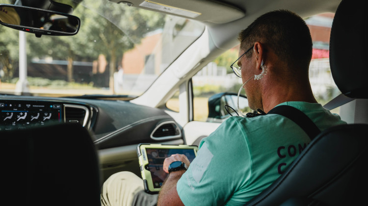 David Prater, peer support specialist, prepares to respond to a call in Durham. - Angela Hollowell / Tradeoffs