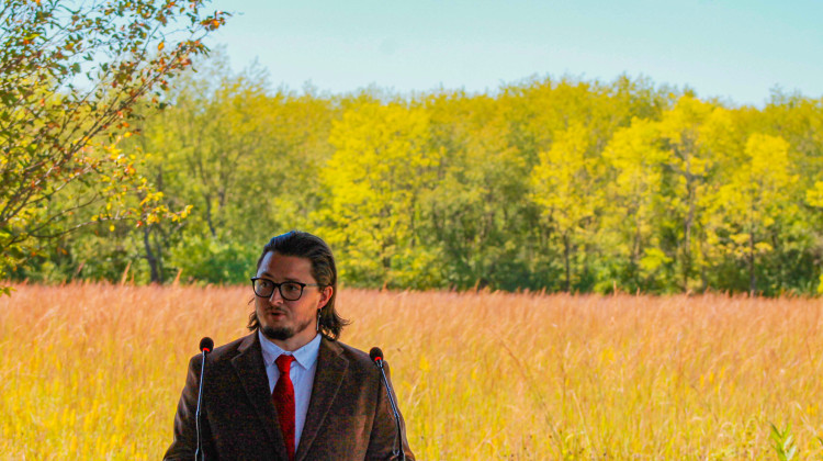 Miami Tribe of Oklahoma Tribal Historic Preservation Officer Logan York speaks at the announcement of a $50 million Lilly Endowment grant to the Indiana State Parks at Prophetstown State Park on Sept. 4, 2024. - Brandon Smith / IPB News