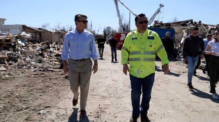 U.S. Sen. Todd Young toured tornado destruction in Sullivan Monday with Mayor Clint Lamb. - Devan Ridgway/WFIU/WTIU News