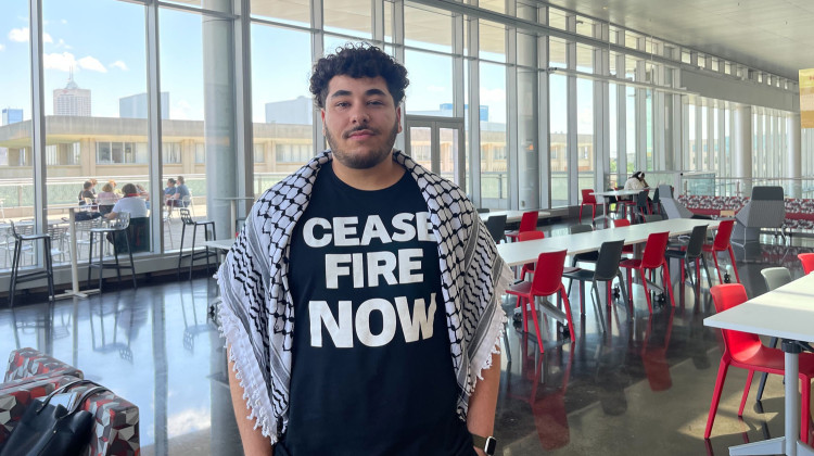 Yaqoub Saadeh at the Indiana University Indianapolis campus on Wednesday, May 22, 2024. Saadeh just graduated a degree in psychology and says he is overwhelmed by watching daily updates on the war in Gaza. - Sydney Dauphinais / WFYI
