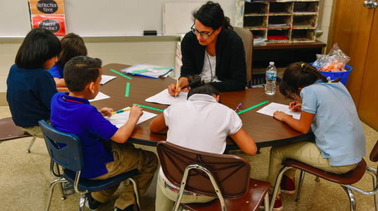 A teacher and students work at Indianapolis Public Schools' Meredith Nicholson School 96 - Indianapolis Public Schools