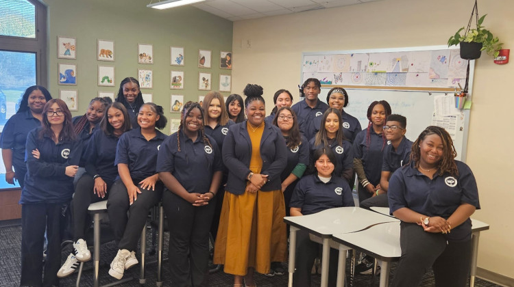 Mary Easley, center, stands with her Lawrence Township students who went to the Indiana Statehouse last month as part of signing day for the state’s new early childhood education teacher apprenticeship program. - Courtesy of Mary Easley