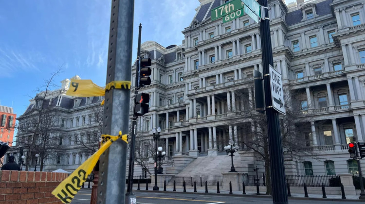 Police tape at the scene where Secret Service officers say shot a man near the White House. Washington D.C., 17th and F St NW, Mar. 9 2025. - Luke Garrett/NPR