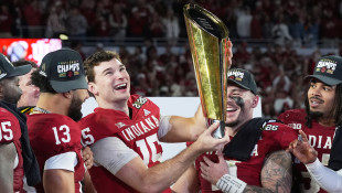 Indiana completes undefeated season and wins 1st national title, beating Miami 27-21 in College Football Playoff final