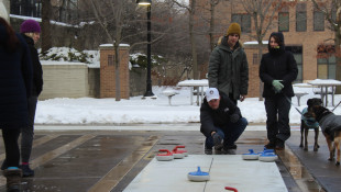 Free curling clinic lets participants flex their muscles along the canal